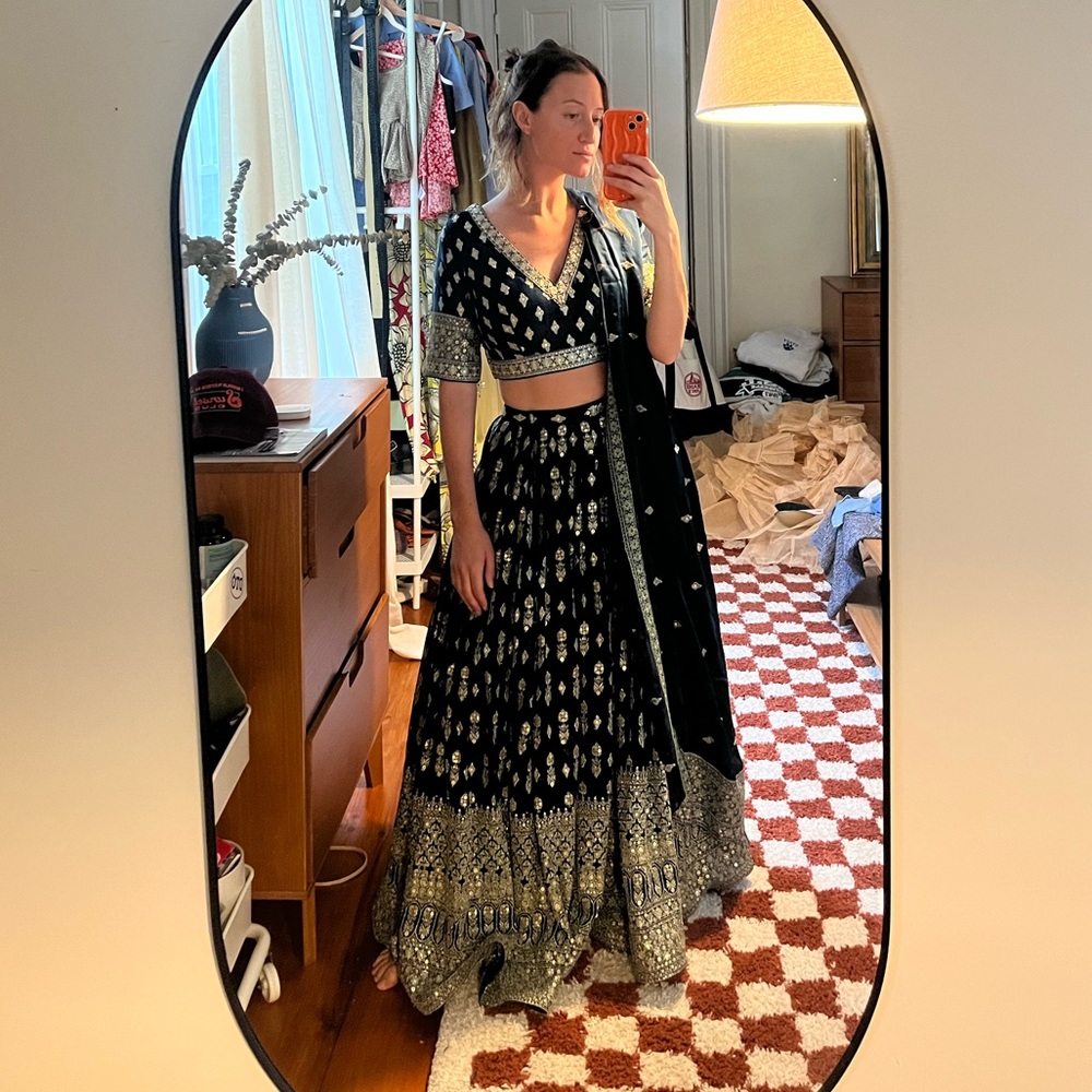 Dark teal and gold lehenga